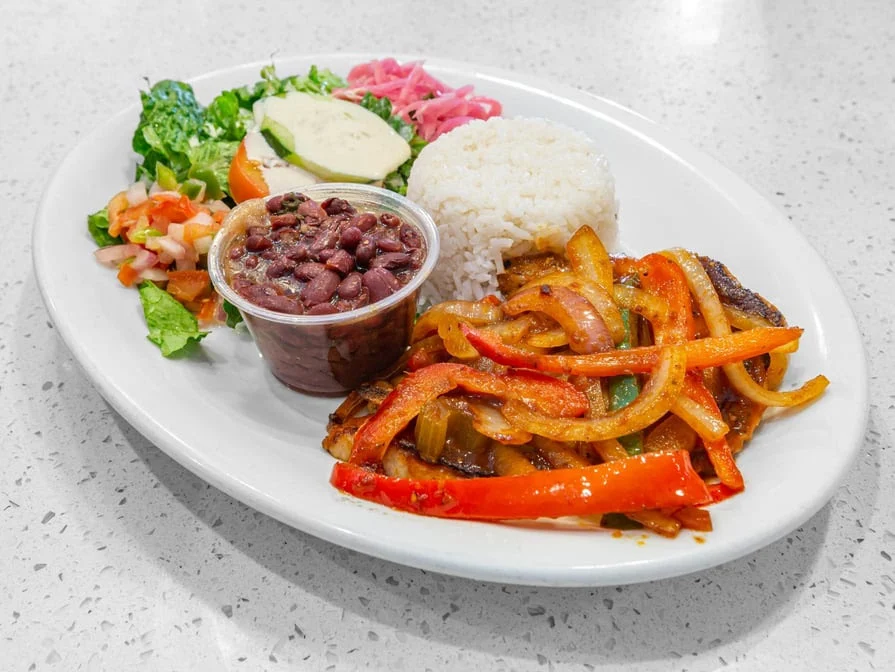 Bistec Encebollado - Steak with caramelized onions, a Honduran comfort classic